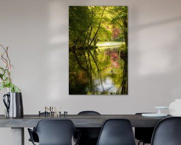 Paysage fluvial avec un oiseau d'eau sur Anita van Gendt