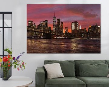 Skyline of Manhattan and Brooklyn Bridge at sunset, New York, USA by Markus Lange