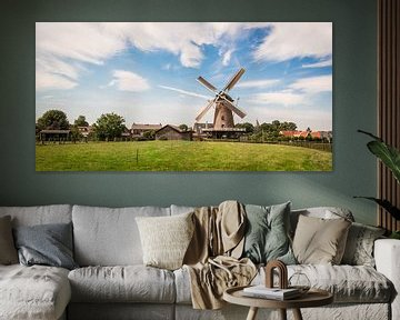 Een echt Hollands landschap met een molen van Peter de Jong