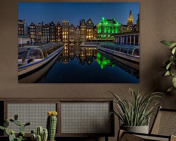 Canal houses Damrak Amsterdam. by Leon Okkenburg