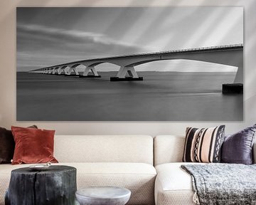 Sea bridge long shutter speed in black and white by Marjolein van Middelkoop