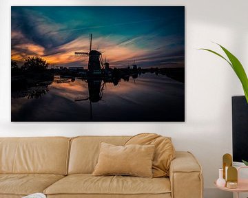 Silhouette de moulin au coucher du soleil à Kinderdijk sur Schram Fotografie