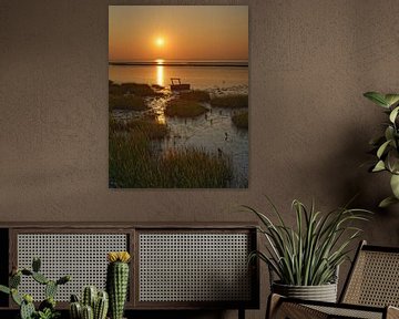 Avond in het wad met zonsondergang van Peter Eckert