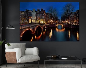 Les canaux d'Amsterdam la nuit sur John Leeninga
