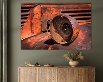 Old rusty headlight from a Pick-Up Truck. by Jan van Dasler