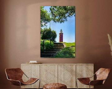 Ouddorp lighthouse in Zeeland among the trees by Kristof Leffelaer