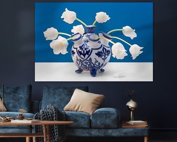 White tulips in blue/white tulip vase by Floris Kok