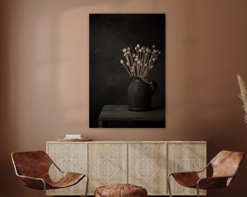 Still life with branches of dried poppy bulbs in grey stone jar (vertical) by Mayra Fotografie