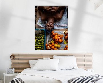 Sleeping man at a fruit market in Colombo, Sri Lanka by Teun Janssen