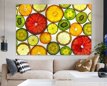 Collage of slices of fruit and vegetables with a white background. by Carola Schellekens