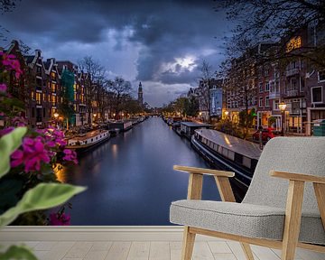 Donkere wolken boven de grachten van Amsterdam van Teun Janssen