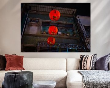 Red Chinese lanterns in the streets of Taipei by Teun Janssen