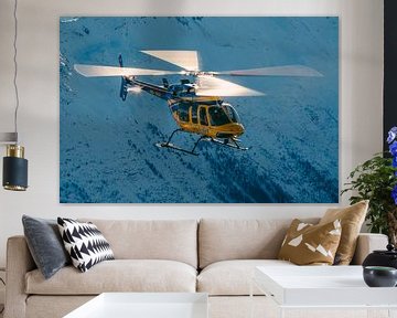 Le Bell 407 survolant les Alpes suisses sur Jimmy van Drunen