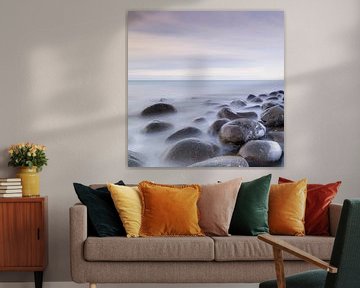 Round stones in a coastal landscape by Charlotte Jalvingh