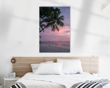 Palmboom en roze zonsondergang