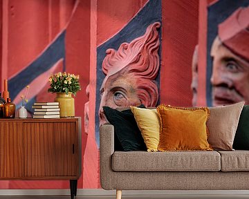 Koppen op ramen op het Raadhuis van Bazel in Zwitserland van Joost Adriaanse