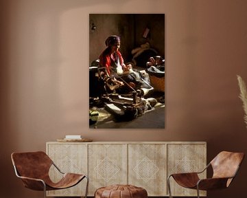 Tibetan woman on a spinning wheel by Henk Meijer Photography