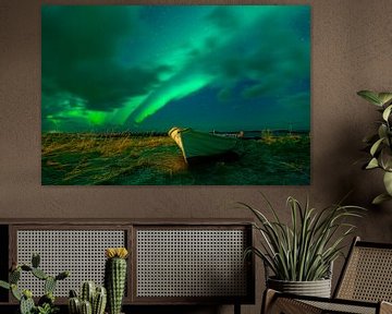 Northern lights over a rowing boat by Tilo Grellmann