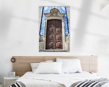 Wooden door and blue tiles in Porto Portugal by My Footprints