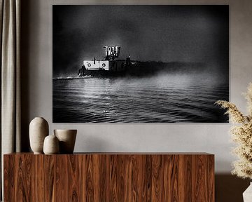 Inland navigation barge at dawn in mist, in black and white by John Quendag