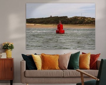 Red buoy off the coast of West-Terschelling by Mirjam Welleweerd