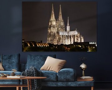 Illuminated Cologne Cathedral at night by Tom Voelz