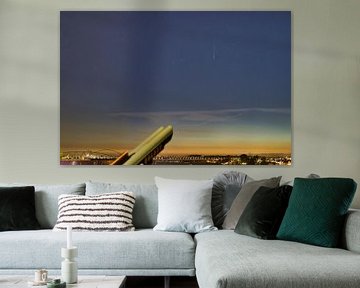 Comet Neowise above the river Waal in evening light. by Machiel Zwarts