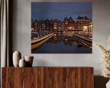 Les canaux de Damrak à Amsterdam sur Pepijn Knoflook