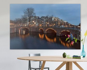 Amsterdam, Reguliersgracht and Keizersgracht at dusk. by Maurits van Hout