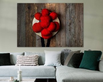 old Bollen hat in front of wooden wall by Jürgen Wiesler