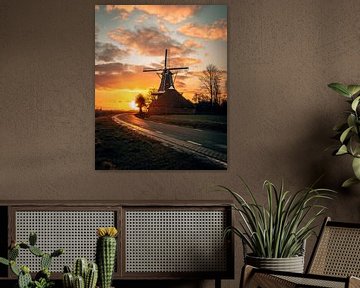 Windmill De Hoop in Groningen Netherlands during sunrise