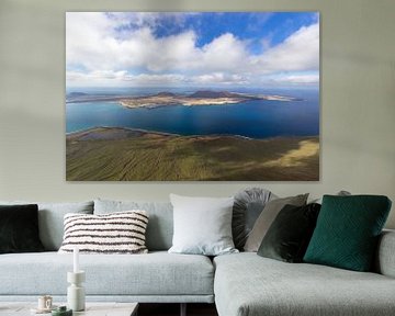 Panoramic view of the island La Graciosa from the viewpoint Mirador del Rio on the island Lanzarote by Reiner Conrad