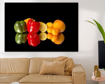 Fruit and vegetables on a mirror. by Brian Morgan