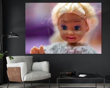 Cheerful blond plastic doll by Margreet van Tricht