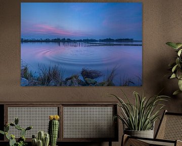 Water wrinkles at sunset by Marcel Kerdijk