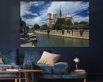 Boats along the banks of the Seine and Notre Dame cathedral in Paris, France by Jan Kranendonk