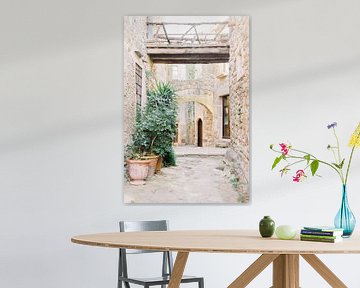 Medieval village Spain | Little street with old bricks and bridges | Travel photography art print by Milou van Ham