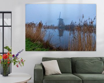 Molen Kinderdijk in de mist van Merijn Loch