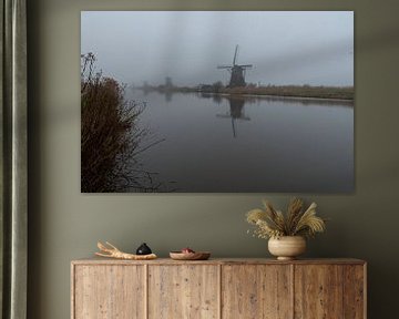 Kinderdijk Windmühle im Nebel von Merijn Loch