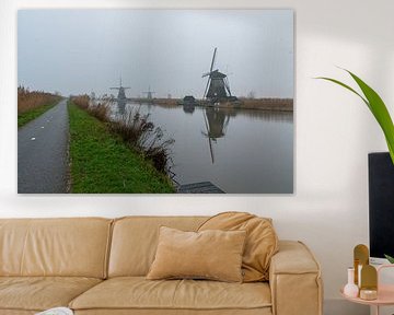 Kinderdijk Windmühle im Nebel von Merijn Loch