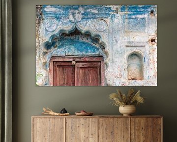 Typical Indian gate above a door of an old house in Orchha by Marc Venema