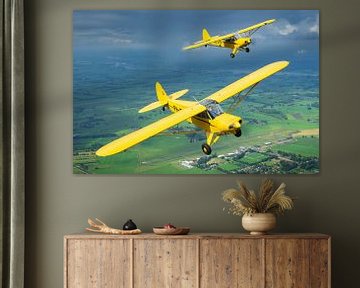 Two Piper Super Cub Aircraft in formation by Planeblogger