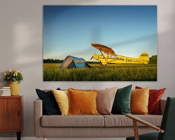 Piper Super Cub plane with tent in meadow by Planeblogger