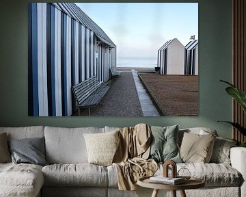 Blue and white striped bathhouses on the coast of Normandy.e. by Christa Stroo photography