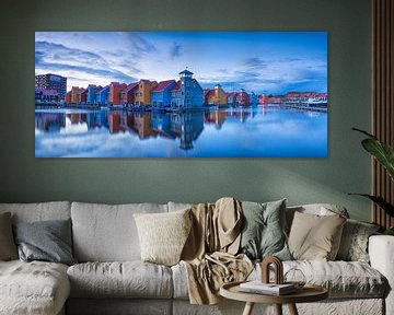 The colored houses of Reitdiephaven in the City of Groningen during a beautiful, calm sunset. by Bas Meelker