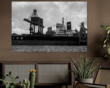 Ships at the harbour unloading under the crane. by scheepskijkerhavenfotografie