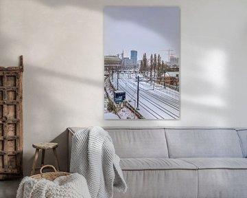 Train tracks covered in snow by Jasper Scheffers