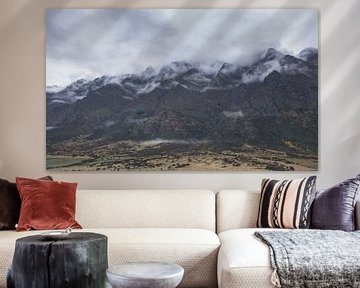 The Remarkables mountains in cloud bed Queenstown by Tom in 't Veld