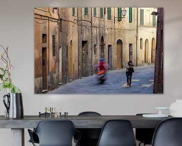 Motorcyclist in medieval alley Siena by Rob van Esch