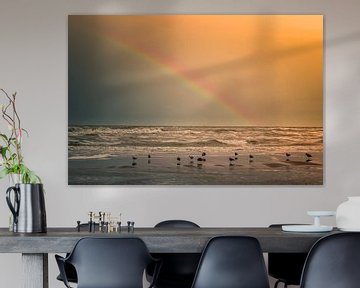 Rainbow on the beach by Peet Romijn